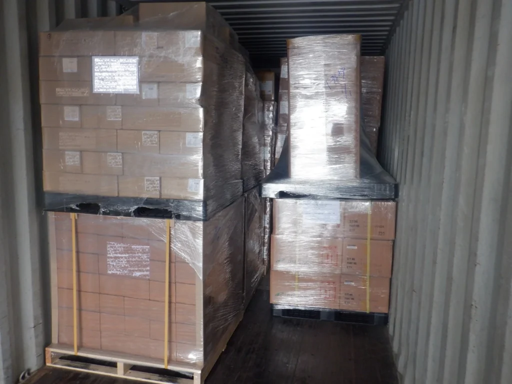 Stacked pallets in a shipping container for LCL China to UK shipping