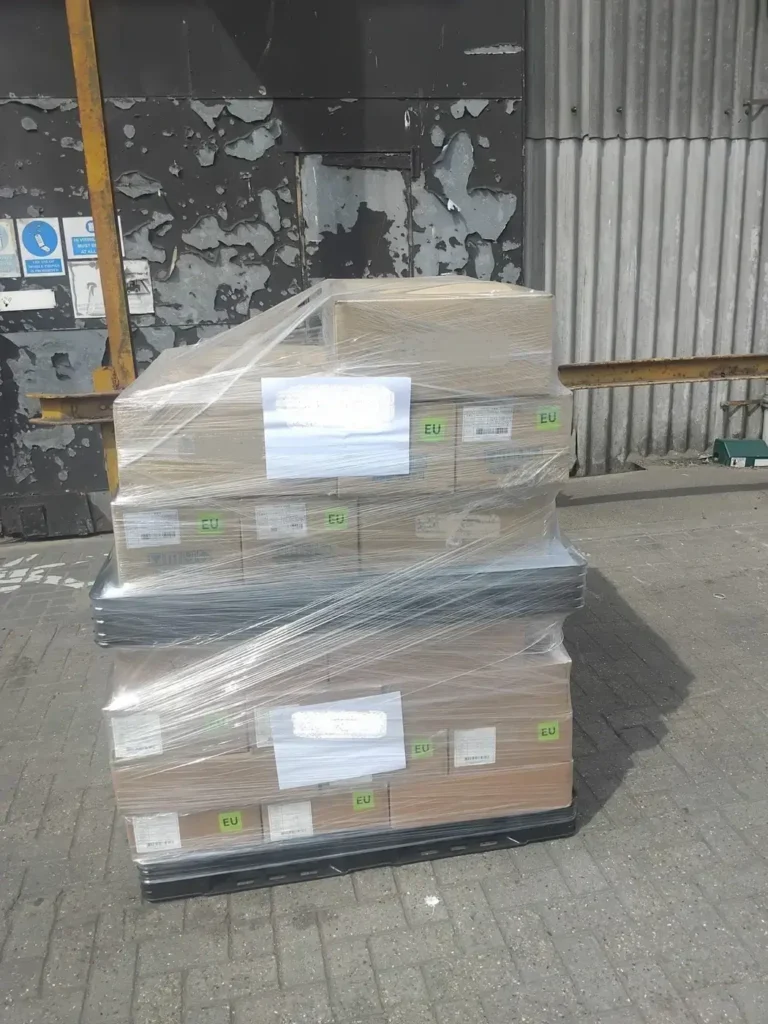 Shrink wrapped pallet consisting of brown cardboard boxes, for shipping pallets from South Korea to the UK
